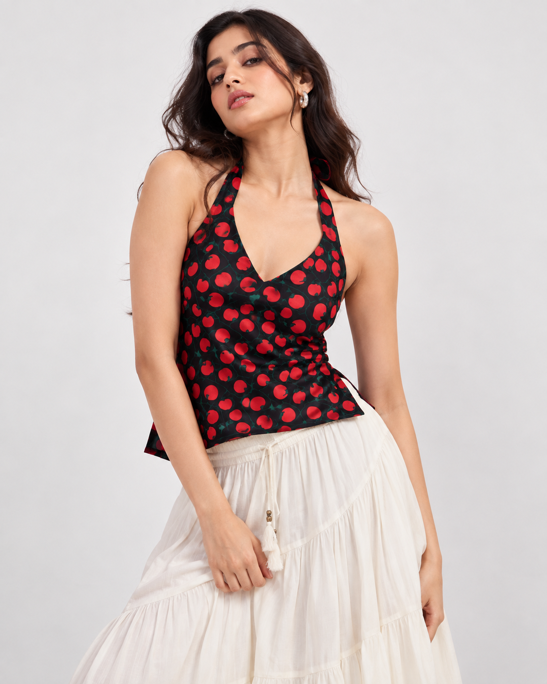 Black red tomato print halter crop top on model front