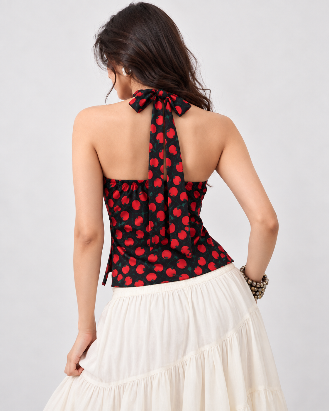 Black red tomato print halter crop top on model back