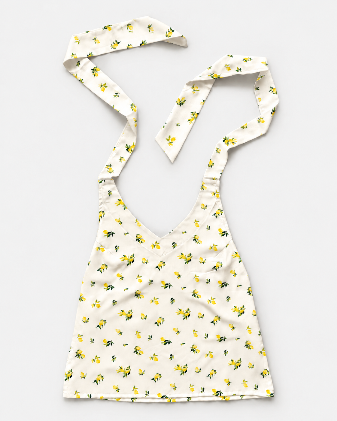 Cream yellow lemon print halter crop top front
