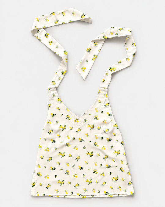Cream yellow lemon print halter crop top front