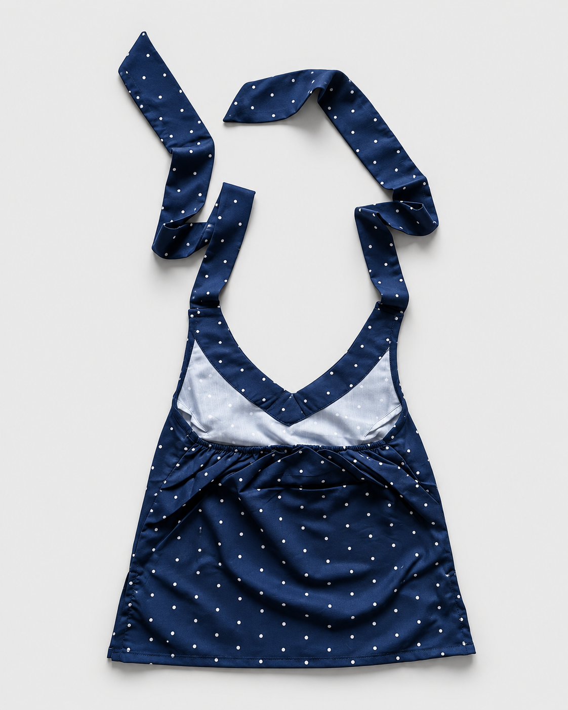 Navy blue white polka-dot halter crop top back