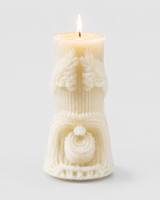 Grey Exim decorative crest sculpture French Vanilla candle front view